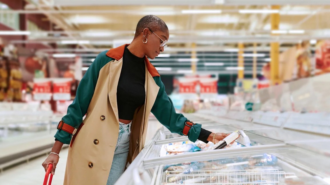 person shops for frozen food staples to stock pantry